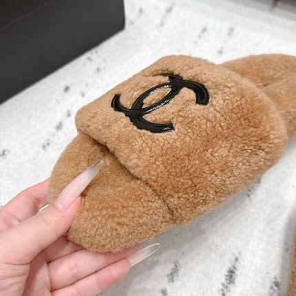 CHANEL 26S SLIDE MULES IN BROWN SHEARLING AND BLACK CC LOGO