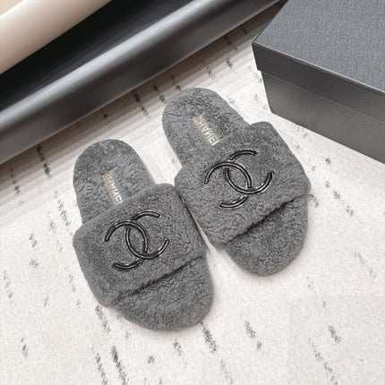 CHANEL 26S SLIDE MULES IN GREY SHEARLING AND BLACK CC LOGO