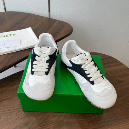 BOTTEGA VENETA 26S ORBIT FLASH SNEAKERS IN WHITE AND BLACK SUEDE