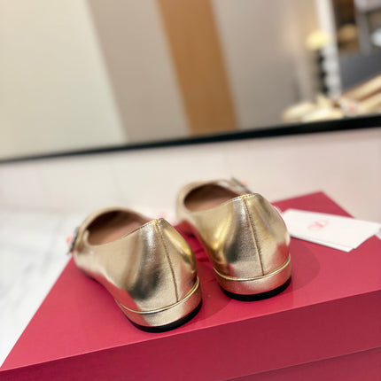 VALENTINO 26S MARY JANE FLATS IN METALLIC GOLD CALFSKIN WITH CRYSTAL FLOWER