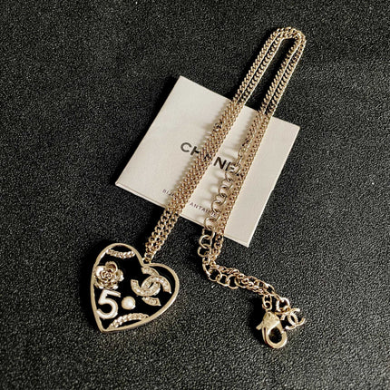 CHANEL 26S DOUBLE C LOGO HEART CHARM NECKLACE WITH NO.5 & FLORAL DETAIL IN GOLD METAL 630796