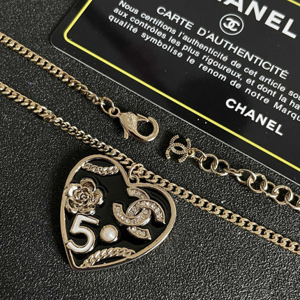CHANEL 26S DOUBLE C LOGO HEART CHARM NECKLACE WITH NO.5 & FLORAL DETAIL IN GOLD METAL 630796