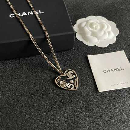 CHANEL 26S DOUBLE C LOGO HEART CHARM NECKLACE WITH NO.5 & FLORAL DETAIL IN GOLD METAL 630796