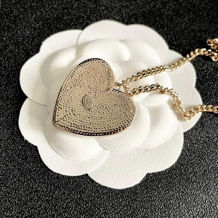 CHANEL 26S DOUBLE C LOGO HEART CHARM NECKLACE WITH NO.5 & FLORAL DETAIL IN GOLD METAL 630796