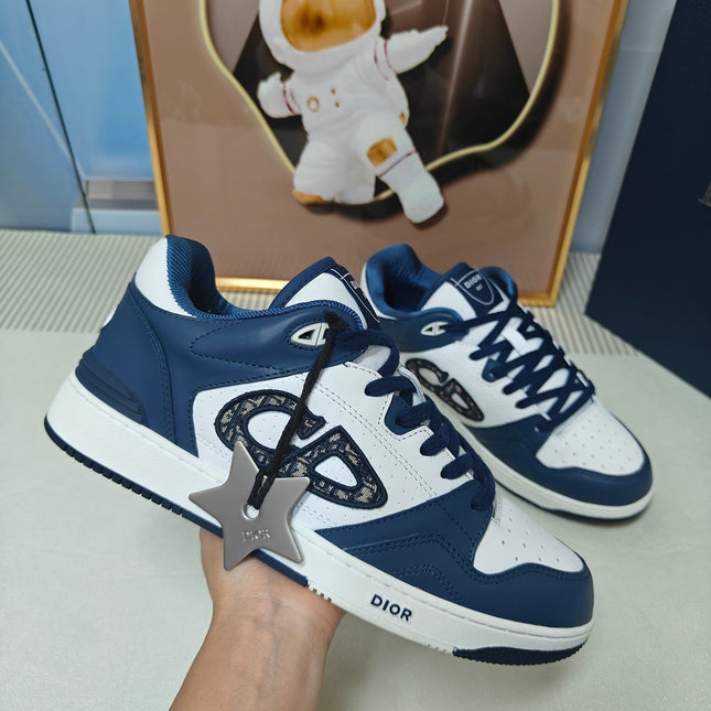 DIOR 26S LOW-TOP SNEAKER IN WHITE AND NAVY BLUE CALFSKIN
