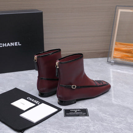 CHANEL 26S ANKLE BOOTS IN BURGUNDY CALFSKIN WITH BLACK PATENT LEATHER TRIM AND CC LOGO ON TOE CAP