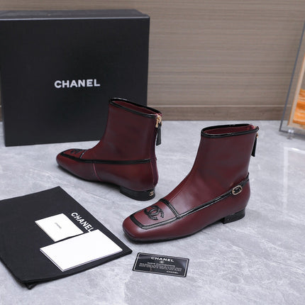 CHANEL 26S ANKLE BOOTS IN BURGUNDY CALFSKIN WITH BLACK PATENT LEATHER TRIM AND CC LOGO ON TOE CAP