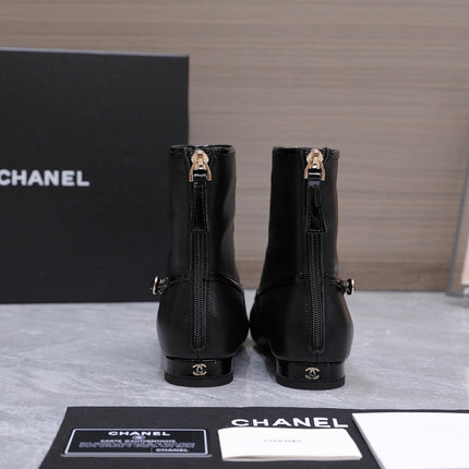 CHANEL 26S ANKLE BOOTS IN BLACK CALFSKIN WITH PATENT LEATHER TRIM AND CC LOGO ON TOE CAP