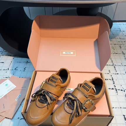MIUMIU 26S LACE UP SNEAKERS IN BROWN CALFSKIN BUCKLE STRAP DETAIL