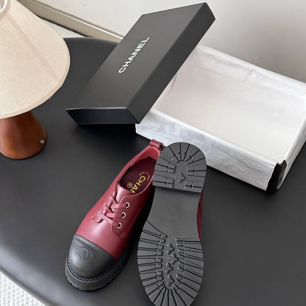 CHANEL 26S LACE UP PLATFORM IN BLACK AND RED CALFSKIN