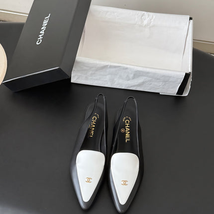 CHANEL 26S SLINGBACK FLAT IN BLACK AND WHITE CALFSKIN WITH CC LOGO