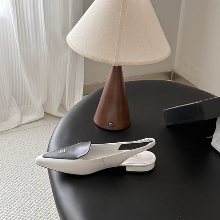 CHANEL 26S SLINGBACK FLAT IN BLACK AND WHITE CALFSKIN