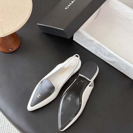 CHANEL 26S SLINGBACK FLAT IN BLACK AND WHITE CALFSKIN