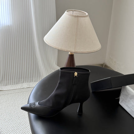 CHANEL 26S ANKLE BOOTS IN BLACK LAMBKIN