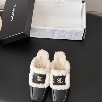 CHANEL 26S MULES IN BLACK SHEARLING AND CALFSKIN