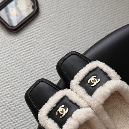 CHANEL 26S MULES IN BLACK SHEARLING AND CALFSKIN