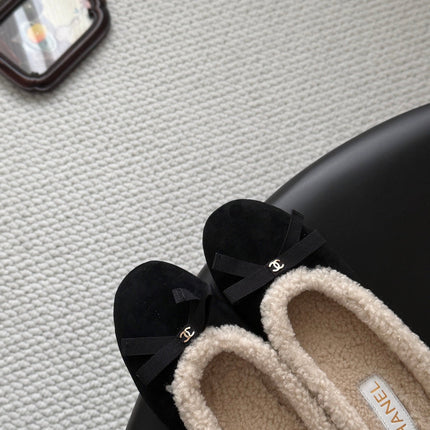 CHANEL 26S MULES IN BLACK SUEDE AND SHEARLING