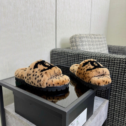 CHANEL 26S PLATFORM SLIDE SANDALS IN CAMEL AND BLACK SHEARLING DALMATIAN PRINT